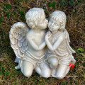 life size fiberglass statues of boy and girl with wings